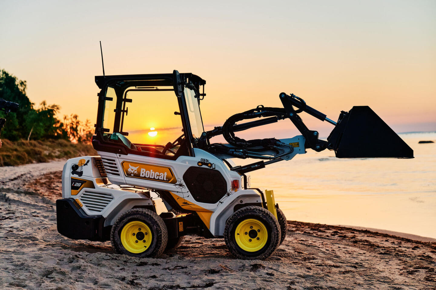 yellow bobcat machine logo