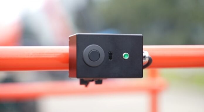 Two Sensors, Two Warnings: Sinoboom Brings Collision Avoidance to Scissor Lifts Sinoboom's Collision Avoidance Radar System sensor unit mounted on the platform rail (Image: Sinoboom)