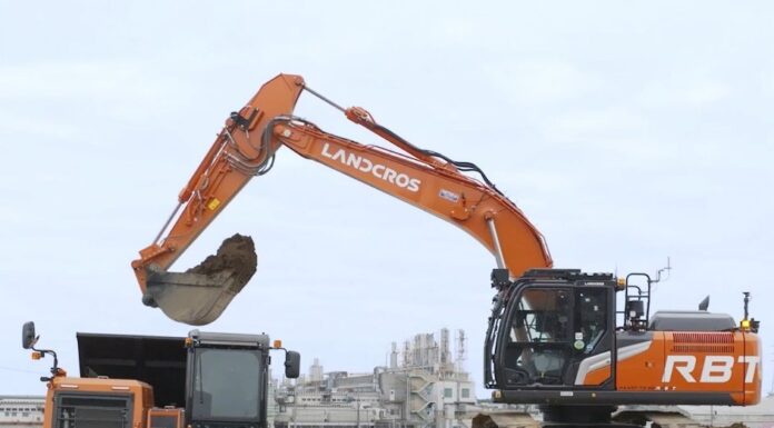 Medium hydraulic excavator performing excavation work