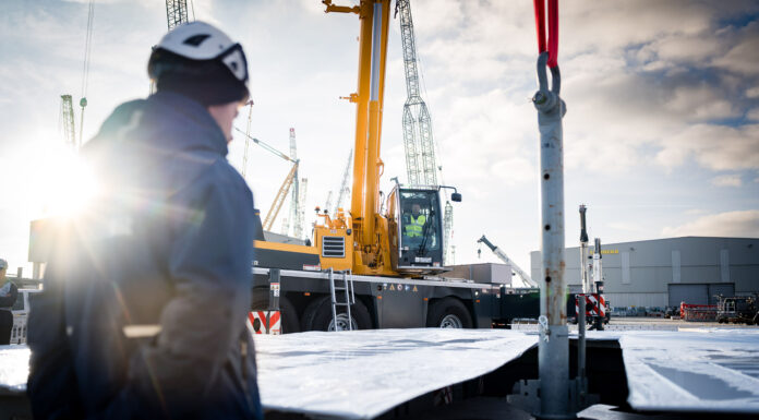 Liebherr Puts the Crane Operator on the Podium With a Second Game of Cranes Liebherr mobile crane operator at work during a Game of Cranes challenge at the Ehingen plant