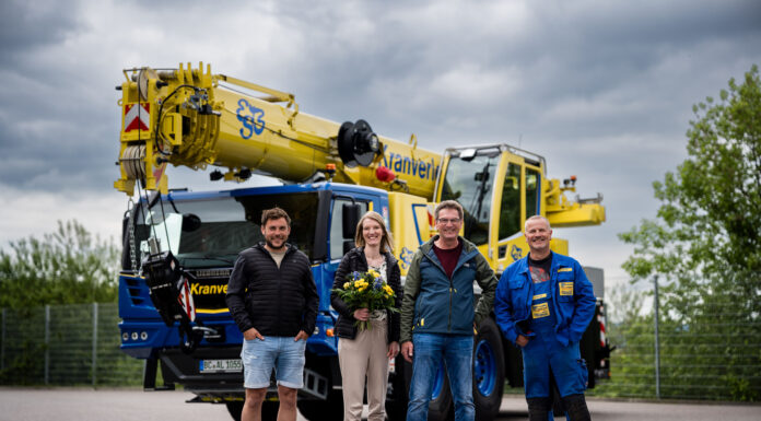 New Crane, New Generation: ESB Renews Both Fleet and Management The ESB team with the company's new Liebherr LTM 1055-3.3