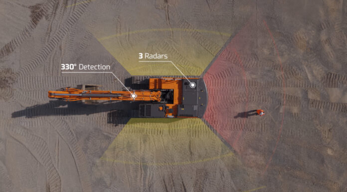 A DEVELON Series 9 crawler excavator equipped with camera and radar safety technology