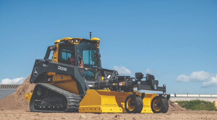 A John Deere 333 P-Tier compact track loader with the new BX07 SmartGrade Box Blade